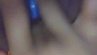 Ebony teen plays with her wet creamy pussy