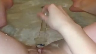 Amateur Teen Melanie uses Glass Toy in bathtub