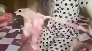 a young girl in a polka-dot dress, tore a long red cloth