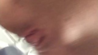 Teen riding dildo while parents watch tv.